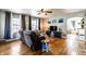 Cozy living room featuring hardwood floors, ample natural light, and comfortable seating at 1733 N Spencer Ave, Indianapolis, IN 46218