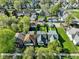 An aerial view showcasing the neighborhood's charming homes and lush greenery at 1917 Fletcher Ave, Indianapolis, IN 46203