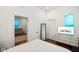 Well-lit bedroom with a view into an adjacent living area, offering a comfortable and inviting space at 1917 Fletcher Ave, Indianapolis, IN 46203