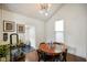 Bright dining room with modern lighting and hardwood floors at 1917 Fletcher Ave, Indianapolis, IN 46203