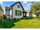Charming home with manicured lawn and lovely curb appeal at 1917 Fletcher Ave, Indianapolis, IN 46203
