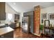 Modern kitchen with stainless steel appliances, gray cabinetry, and hardwood floors at 1917 Fletcher Ave, Indianapolis, IN 46203