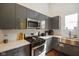 Beautiful kitchen featuring stainless steel appliances and a large sink at 1917 Fletcher Ave, Indianapolis, IN 46203