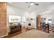 Stylish living room with hardwood floors and view into dining area at 1917 Fletcher Ave, Indianapolis, IN 46203