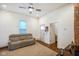 Bright living room featuring a plush sofa and hardwood floors at 1917 Fletcher Ave, Indianapolis, IN 46203