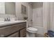 Clean bathroom with white fixtures, grey cabinets, and modern finishes at 19600 Atwater Ave, Sheridan, IN 46069