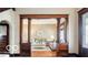 Bright, inviting living room with an ornate passageway and comfortable seating area at 2001 Hoyt Ave, Indianapolis, IN 46203