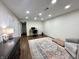 Finished basement featuring recessed lighting, desk area, and neutral decor creating a versatile living space at 210 Prairie Pkwy, Brownsburg, IN 46112