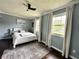 Calm bedroom featuring natural light, neutral decor and a ceiling fan at 210 Prairie Pkwy, Brownsburg, IN 46112