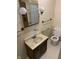 Bathroom with a classic vanity and toilet at 2141 N Cole St, Indianapolis, IN 46224