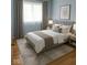 Calm bedroom featuring a comfortable bed, soft colors, and natural light at 2141 N Cole St, Indianapolis, IN 46224