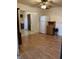 View of the dining room with a refrigerator and wood look flooring at 2141 N Cole St, Indianapolis, IN 46224