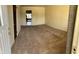 Inviting carpeted living room with an open view and natural light at 2141 N Cole St, Indianapolis, IN 46224