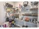 Pantry with wire shelving fully stocked with food items and cooking supplies at 2168 Hengist Dr, Westfield, IN 46074