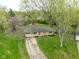 Aerial shot of home displaying a well-maintained lawn and driveway at 225 Vali Ct, Carmel, IN 46280