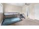 Cozy bedroom with bunk bed, desk area, carpet, and soft, neutral wall colors at 225 Vali Ct, Carmel, IN 46280