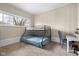 Bright bedroom features a bunk bed, desk, soft neutral wall color, and carpet at 225 Vali Ct, Carmel, IN 46280