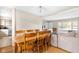 Bright dining area adjacent to the living room, perfect for Gathering meals at 225 Vali Ct, Carmel, IN 46280