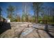 Backyard featuring a large in-ground pool ready for renovation, perfect for summer fun at 2394 W 600 S, New Palestine, IN 46163