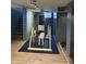 Workout area in basement with exercise equipment set on a dark mat, offering a dedicated space for fitness routines at 263 Clark Ave, Beech Grove, IN 46107
