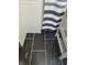 Chic bathroom with marble tile floors and a modern vanity at 263 Clark Ave, Beech Grove, IN 46107