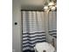 Modern bathroom design with stylish sink, mirror, and sconces at 263 Clark Ave, Beech Grove, IN 46107