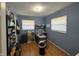 Bedroom features natural light from two windows and hardwood floors at 263 Clark Ave, Beech Grove, IN 46107