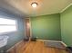 Spacious bedroom with hardwood floors and a bright, airy feel at 263 Clark Ave, Beech Grove, IN 46107