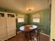 Cozy dining room featuring a wood table and natural light at 263 Clark Ave, Beech Grove, IN 46107