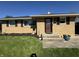Charming brick home with a well-manicured lawn and flower beds at 263 Clark Ave, Beech Grove, IN 46107
