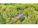 Aerial view of property with the house, garage, and surrounding trees at 2920 N Buck Creek Rd, Greenfield, IN 46140