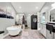 Bathroom with a free-standing tub, shower, vanity, and sauna, creating a relaxing spa-like atmosphere at 2920 N Buck Creek Rd, Greenfield, IN 46140