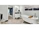 Bright bathroom with a free-standing tub, vanity, and access to a walk-in closet at 2920 N Buck Creek Rd, Greenfield, IN 46140