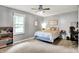 Cozy bedroom featuring a ceiling fan and a window offering natural light at 2920 N Buck Creek Rd, Greenfield, IN 46140