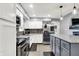 Well-lit kitchen with stainless steel appliances, ample counter space, and a stylish backsplash at 2920 N Buck Creek Rd, Greenfield, IN 46140