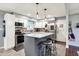 Charming kitchen with stainless appliances, granite counters, a stylish island, and tiled backsplash at 2920 N Buck Creek Rd, Greenfield, IN 46140