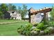 Welcome to Cedar Ridge! Beautiful landscaping at the entrance to the community at 300 Atlas Dr, Lebanon, IN 46052