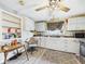 A kitchen featuring ample counter space, tile backsplash, stainless steel appliances and light-colored cabinets at 306 W Clyde St, Frankton, IN 46044