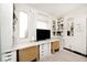 Home office offering built-in desks, lots of storage, and stylish decor at 316 S Arlington Ave, Indianapolis, IN 46219