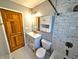 This renovated bathroom offers modern fixtures and a shower, perfect for relaxation and style at 3514 Carson Ave, Indianapolis, IN 46227