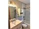 Renovated bathroom boasts modern fixtures and a tub-shower, creating a spa-like atmosphere at 3514 Carson Ave, Indianapolis, IN 46227