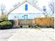 Back of the house with access door and fencing at 3514 Carson Ave, Indianapolis, IN 46227