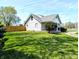 Charming home with a well-manicured lawn and a privacy fence at 3514 Carson Ave, Indianapolis, IN 46227