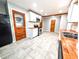 Modern kitchen featuring butcher block countertops, stainless steel appliances, and ample cabinet space at 3514 Carson Ave, Indianapolis, IN 46227