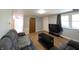 Living room boasts natural light, neutral paint, and modern furnishings at 3514 Carson Ave, Indianapolis, IN 46227