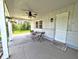 Inviting porch with a ceiling fan and seating, ideal for enjoying the outdoors at 3514 Carson Ave, Indianapolis, IN 46227