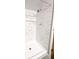 The marble-tiled shower offers a luxurious feel, featuring a built-in niche for added convenience at 3514 Carson Ave, Indianapolis, IN 46227