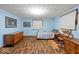 Comfortable bedroom featuring hardwood floors, ample natural light, and classic furniture at 3737 Forest Ter, Anderson, IN 46013