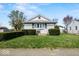 Charming single-story home with a well-maintained lawn and mature landscaping, offering great curb appeal at 3737 Forest Ter, Anderson, IN 46013