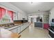 Functional kitchen featuring white cabinetry, ample counter space, and classic appliances for easy meal preparation at 3737 Forest Ter, Anderson, IN 46013